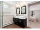 Elegant bathroom featuring double sinks and shower at 5743 Field St, Arvada, CO 80002