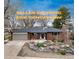 Charming single-story brick home with manicured front yard and an attached garage, offering $10K concession at 5743 Field St, Arvada, CO 80002