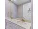 Bathroom featuring double vanity, white marble countertops, and modern fixtures at 10344 Vienna St, Parker, CO 80134