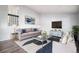 Bright living room with a modern color scheme and stylish decor at 7773 Brentwood Ct, Arvada, CO 80005