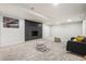 Finished basement with a decorative fireplace, and comfortable seating at 423 Nile St, Aurora, CO 80010