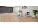 Spacious living room with a statement wall and ample natural light at 423 Nile St, Aurora, CO 80010
