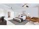 Bedroom suite with an ensuite bath, ceiling fan, and neutral tones for a bright and inviting space at 775 S Alton Way # 3D, Denver, CO 80247
