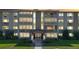 Apartment building exterior with well-maintained lawn at 775 S Alton Way # 3D, Denver, CO 80247