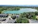 Scenic aerial view of a large lake with surrounding trees and apartments at 775 S Alton Way # 3D, Denver, CO 80247