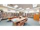 Community library featuring bookshelves and seating at 775 S Alton Way # 3D, Denver, CO 80247