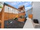 Backyard with playset featuring swings, slide, climbing structure and wood fencing at 11870 Cattle Ln, Parker, CO 80134