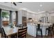 Kitchen and dining area feature granite counters, stainless appliances, and lots of space at 11870 Cattle Ln, Parker, CO 80134