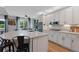 Gourmet kitchen features granite counters, stainless appliances, and hardwood floors at 11870 Cattle Ln, Parker, CO 80134