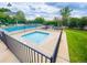 Inviting community pool area with hot tub and plenty of lounge seating at 9512 W Ontario Dr, Littleton, CO 80128