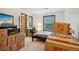 Bedroom with carpet, bed, window, desk, and boxes, providing ample natural light at 2900 Shadow Creek Dr # 201, Boulder, CO 80303
