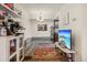 Cozy room featuring unique decor, access to the kitchen, and a comfortable setting at 2900 Shadow Creek Dr # 201, Boulder, CO 80303