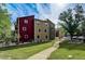 Home exterior with grassy lawn and paved walkway showcasing curb appeal at 2900 Shadow Creek Dr # 201, Boulder, CO 80303