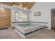Interior shot of a tiled in hot tub featuring large picture window at 2900 Shadow Creek Dr # 201, Boulder, CO 80303