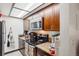 Practical kitchen with stainless steel appliances, lots of cabinet space, and granite counters at 2900 Shadow Creek Dr # 201, Boulder, CO 80303