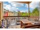 Cozy patio with bike, wooden table, and seating, perfect for relaxing and outdoor dining at 2900 Shadow Creek Dr # 201, Boulder, CO 80303