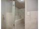 Walk in shower with glass door and tile surround, including seating at 2900 Shadow Creek Dr # 201, Boulder, CO 80303