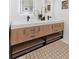 Contemporary bathroom featuring a double vanity, stylish wood cabinets, and modern fixtures at 3775 S Forest Way, Denver, CO 80237