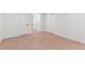 View of the bedroom hallway, with hardwood floors and white walls at 3775 S Forest Way, Denver, CO 80237
