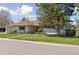 Beautiful single-story home with a well-kept lawn and mature landscaping at 3775 S Forest Way, Denver, CO 80237