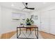 Bright office space featuring hardwood floors, contemporary desk, and stylish decor at 3775 S Forest Way, Denver, CO 80237