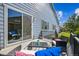 Relaxing back deck with comfortable seating and views of the yard at 12574 Lake View St, Longmont, CO 80504