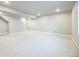 Spacious basement with neutral carpet and light walls, perfect for a recreation or entertainment area at 12574 Lake View St, Longmont, CO 80504