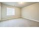Cozy bedroom with neutral carpet, a window, and ample natural light at 12574 Lake View St, Longmont, CO 80504