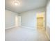 Comfortable bedroom with a walk-in closet, neutral carpet, and recessed lighting at 12574 Lake View St, Longmont, CO 80504