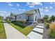 Charming single-Gathering home with well-maintained lawn and inviting front porch at 12574 Lake View St, Longmont, CO 80504