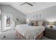 Bright bedroom with a king bed, dresser, and a door leading to a private balcony at 9742 Burntwood Ct, Highlands Ranch, CO 80126