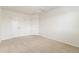 Bedroom features plush carpeting, neutral paint, and two closets at 11761 Cord Grass Way, Parker, CO 80138