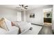 Relaxing bedroom features luxury vinyl flooring, natural light, and modern fixtures at 11761 Cord Grass Way, Parker, CO 80138