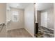 Spacious walk-in closet with carpet and window at 11761 Cord Grass Way, Parker, CO 80138
