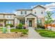 Charming two-story home with stone accents, landscaped front yard, and covered porch at 11761 Cord Grass Way, Parker, CO 80138