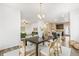 An open floor plan integrates living room, dining and kitchen into one common area for entertaining at 11761 Cord Grass Way, Parker, CO 80138