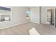 Neutral bedroom with two large windows offering plenty of natural light and a view of the outdoors at 2986 Oxley St, Strasburg, CO 80136