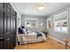 Cozy bedroom featuring wood floors, closet, and good natural light at 3091 S Krameria St, Denver, CO 80222