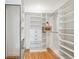 Well organized walk-in closet featuring shelving and plenty of storage space at 3091 S Krameria St, Denver, CO 80222