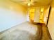 A cozy bedroom with natural light, ceiling fan and attached closet provides a private retreat at 8826 E Florida Ave # 102, Denver, CO 80247