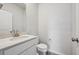 Stylish half bathroom features marble counters and a modern design at 12353 E 101St Pl, Commerce City, CO 80022