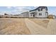 Exterior elevation of a two story home on a spacious lot in a residential area at 12353 E 101St Pl, Commerce City, CO 80022