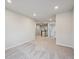 Upstairs hallway featuring neutral colors and carpet flooring at 12353 E 101St Pl, Commerce City, CO 80022