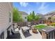 Inviting backyard deck with comfortable seating and a fire pit, perfect for outdoor entertaining and relaxation at 1673 Morningview Ln, Castle Rock, CO 80109