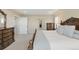 Spacious main bedroom with carpet flooring, neutral walls, and an ensuite bathroom at 1673 Morningview Ln, Castle Rock, CO 80109