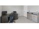 Well-lit home office featuring a modern desk, comfortable chair, and ample storage space for work essentials at 1673 Morningview Ln, Castle Rock, CO 80109