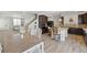 Spacious open floor plan showcasing the dining area, kitchen, and living room at 1673 Morningview Ln, Castle Rock, CO 80109