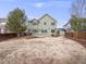 Large backyard with two story home and privacy fence at 18338 E Powers Pl, Centennial, CO 80015