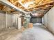 Unfinished basement with exposed ceiling and concrete walls at 18338 E Powers Pl, Centennial, CO 80015