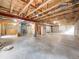 Unfinished basement with exposed ceiling and concrete walls at 18338 E Powers Pl, Centennial, CO 80015